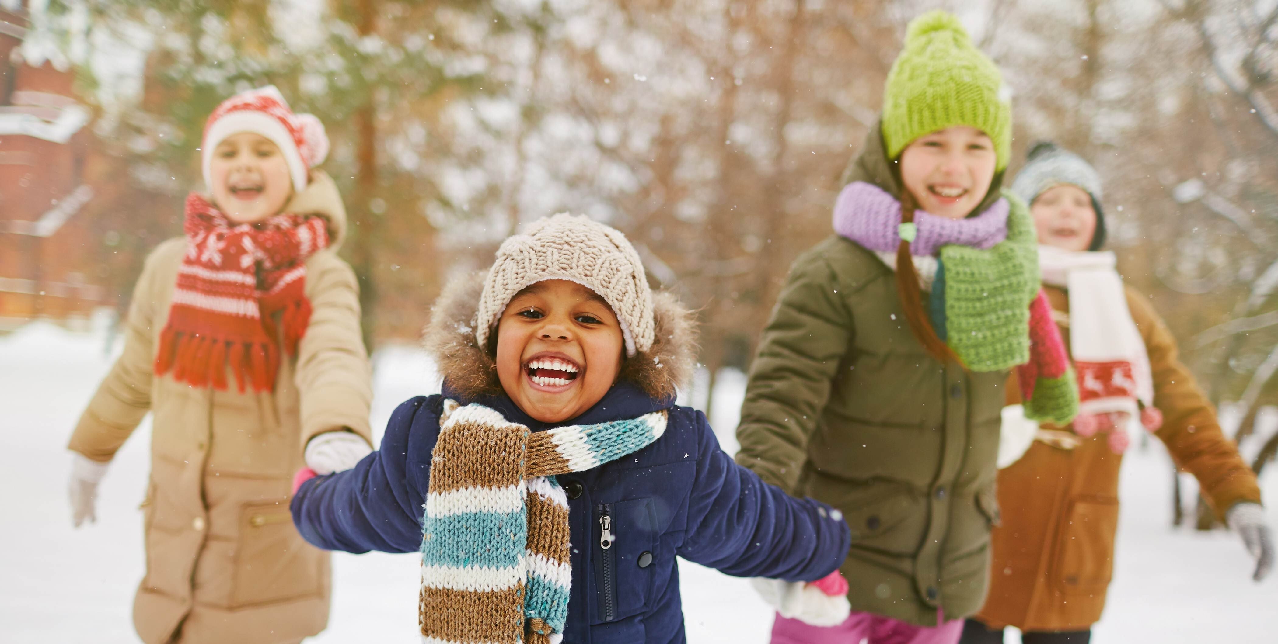 children playing in snow 